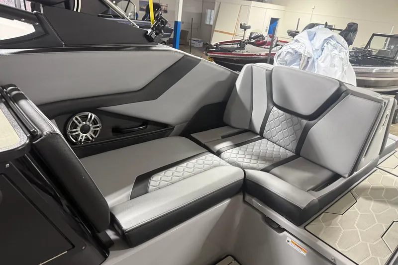 Slide: The Image of Interior of 2026 Yamaha Boats 255XD, featuring sleek gray seating and modern design. - 8