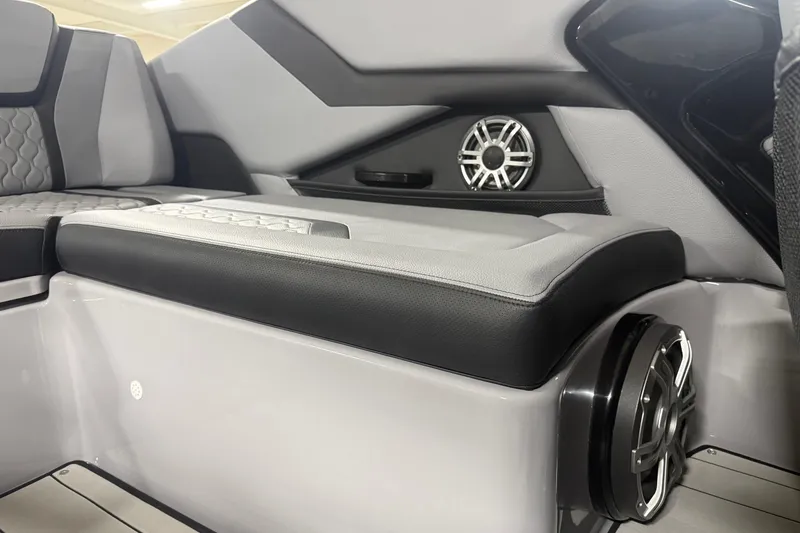 Slide: The Image of 2026 Yamaha Boats 255XD interior with sleek seating and integrated speakers. - 9