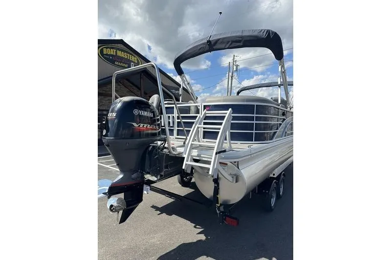 Slide: The Image of 2022 Bennington LPD pontoon boat with Yamaha motor, parked at Boat Masters Marine. - 9