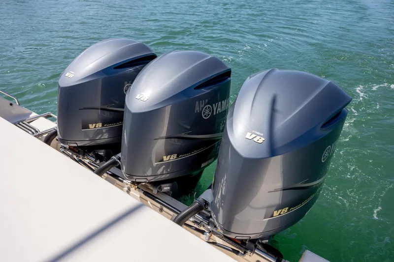 Slide: The Image of Triple Yamaha V8 outboard engines on a 2017 Grady-White Canyon 376 boat. - 20