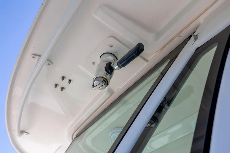 Slide: The Image of Close-up of a 2017 Grady-White Canyon 376 boat's windshield and hardware. - 29