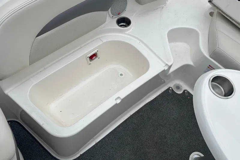 Slide: The Image of Interior of a 2005 Chaparral Sunesta 216 boat with storage compartment. - 19