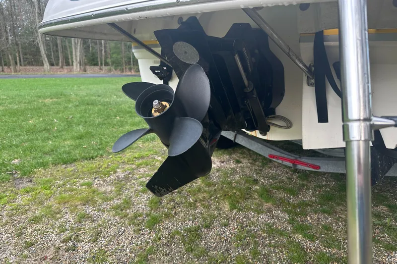Slide: The Image of 2005 Chaparral Sunesta 216 boat propeller and stern view on grass. - 25