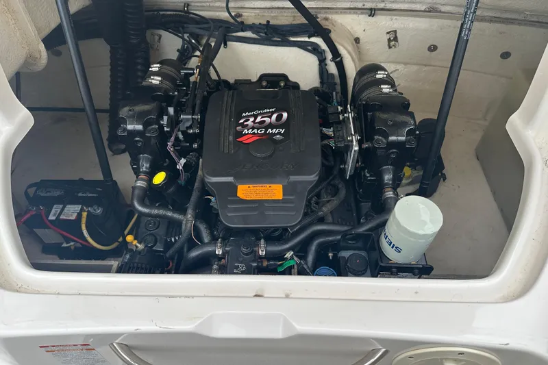 Slide: The Image of Engine compartment of a 2005 Chaparral Sunesta 216 with MerCruiser 350 MAG MPI. - 26