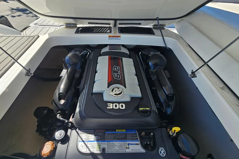 Slide: The Image of Engine compartment of a 2017 Monterey 238SS Super Sport boat, featuring a 6.2L 300 HP engine. - 11