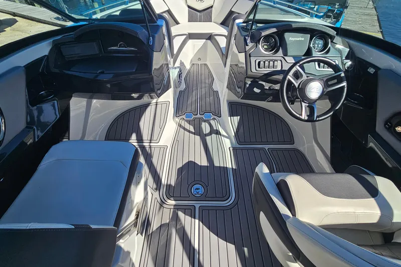 Slide: The Image of Interior of a 2017 Monterey 238SS Super Sport boat with sleek design and modern dashboard. - 15