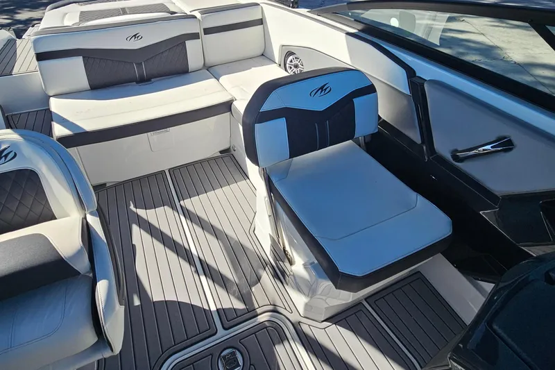 Slide: The Image of 2017 Monterey 238SS Super Sport boat interior with stylish seating and sleek design. - 9