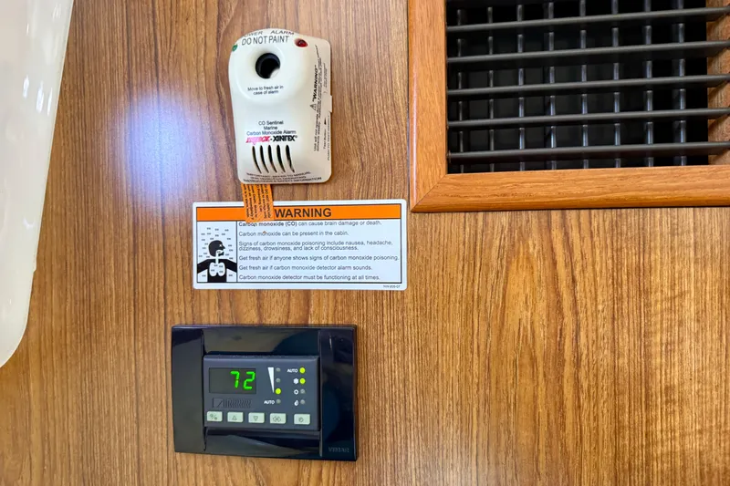 Slide: The Image of Carbon monoxide alarm and thermostat on Pursuit OS 345 Offshore boat, 2012 model. - 17