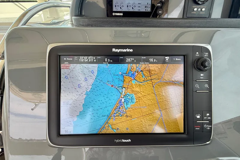 Slide: The Image of Raymarine navigation display on 2012 Pursuit OS 345 Offshore boat dashboard. - 44