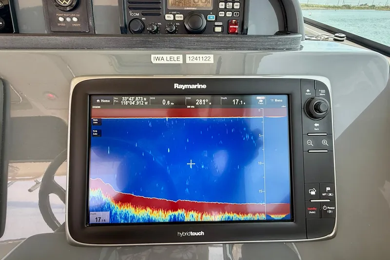 Slide: The Image of Raymarine navigation display on 2012 Pursuit OS 345 Offshore boat, showing depth and coordinates. - 45