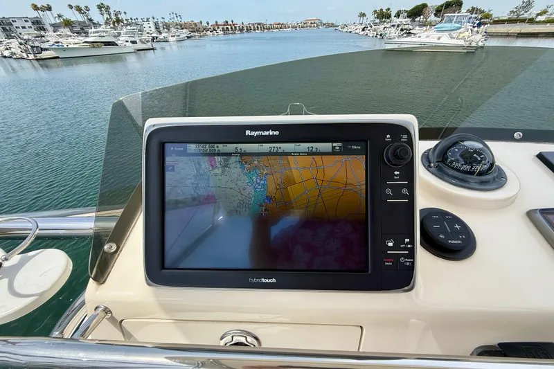 Slide: The Image of Navigation system on 2012 Pursuit OS 345 Offshore boat, displaying nautical chart. - 76