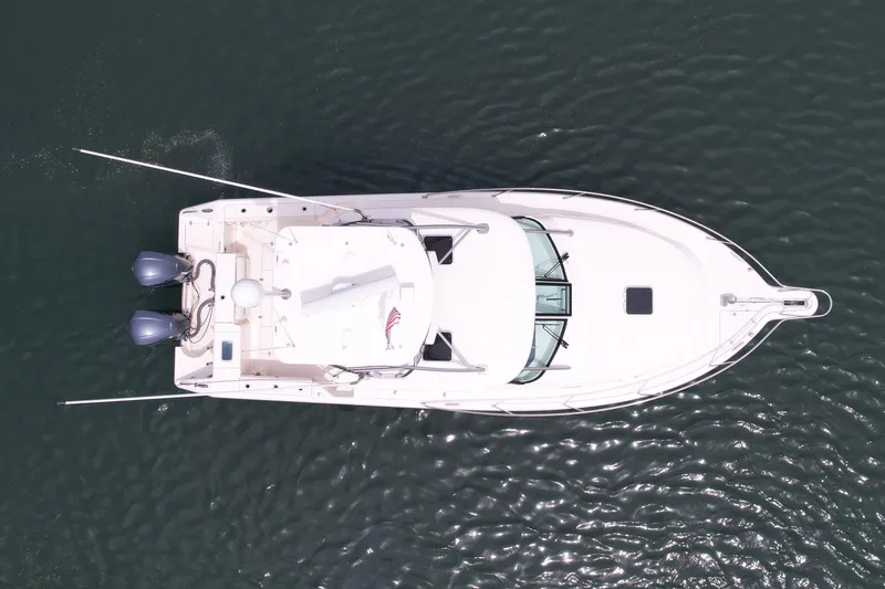 Slide: The Image of Aerial view of 2012 Pursuit OS 345 Offshore boat on water. - 8