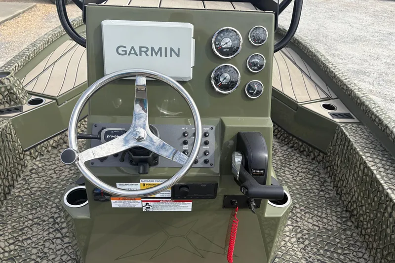 Slide: The Image of Steering console of 2026 Vexus ACX 2210 boat with Garmin navigation system. - 9