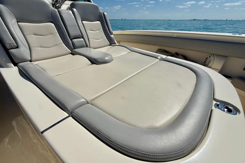 Slide: The Image of Luxurious seating on 2019 Scout 355 LXF boat with ocean view. - 25