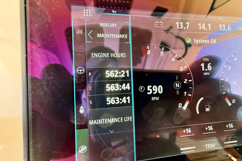 Slide: The Image of Dashboard of a 2019 Scout 355 LXF showing engine hours and RPM. - 35
