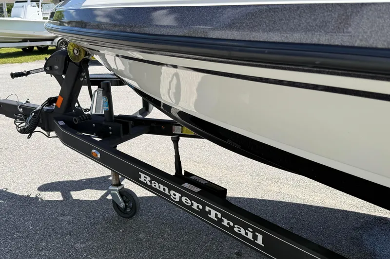 Slide: The Image of 2023 Ranger Z520C Cup-Equipped boat on Ranger Trail trailer, close-up view. - 10
