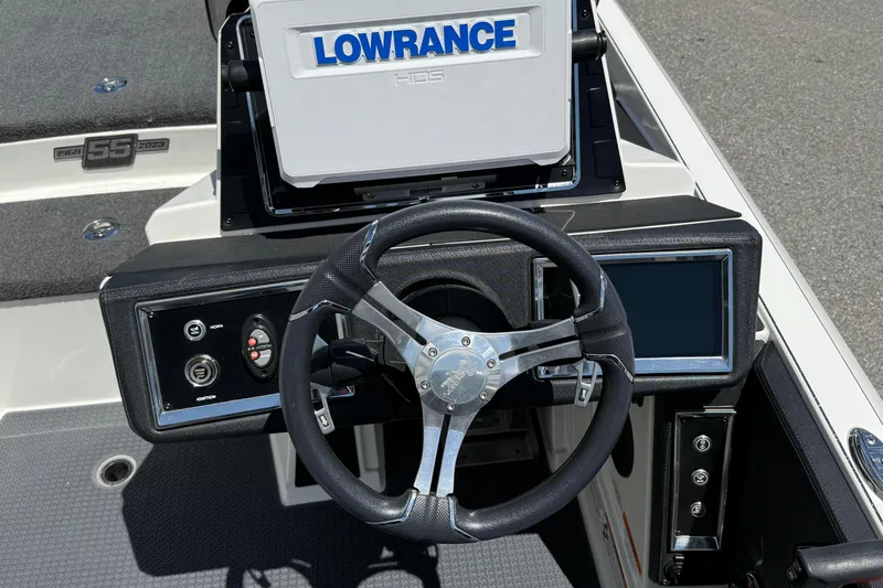 Slide: The Image of 2023 Ranger Z520C Cup-Equipped boat dashboard with Lowrance HDS display and steering wheel. - 19