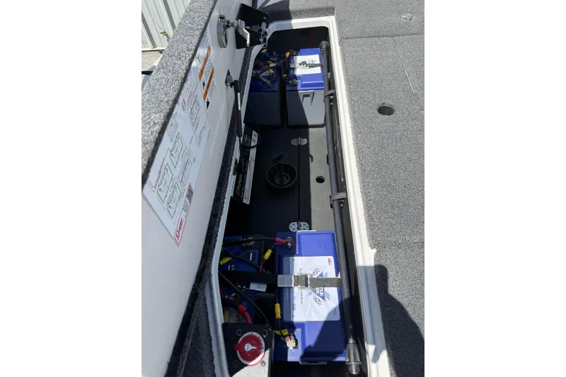 Slide: The Image of 2023 Ranger Z520C Cup-Equipped boat battery compartment with detailed wiring and components. - 22