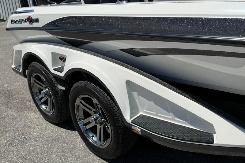 Slide: The Image of 2023 Ranger Z520C Cup-Equipped boat trailer with sleek design and dual wheels. - 3