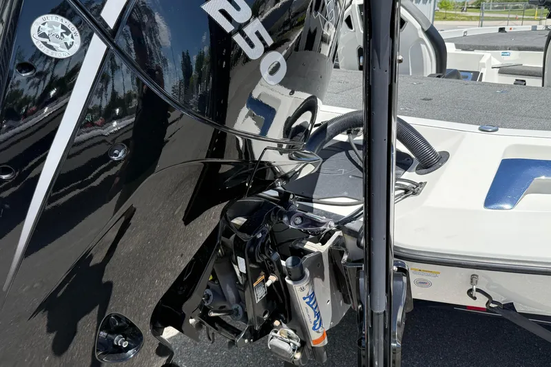 Slide: The Image of 2023 Ranger Z520C Cup-Equipped boat engine detail with sleek black finish. - 5