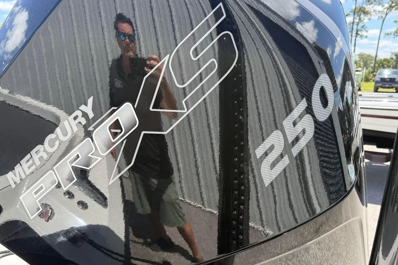 Slide: The Image of Mercury Pro XS 250 engine on 2023 Ranger Z520C Cup-Equipped boat, reflecting surroundings. - 7