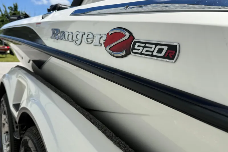 Slide: The Image of 2023 Ranger Z520C Cup-Equipped boat, close-up of logo and design details. - 8