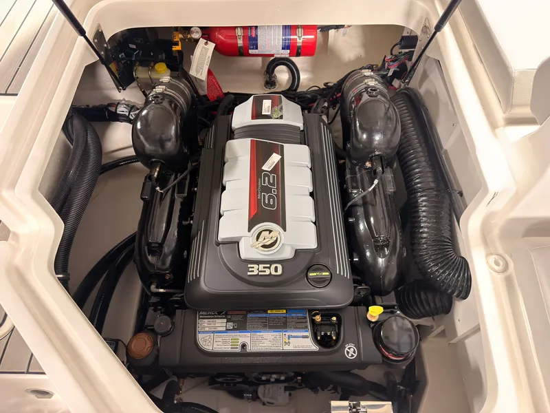 Slide: The Image of The engine compartment of a 2026 Sea Ray SDX 230 Surf with a 6.2-liter engine. - 17