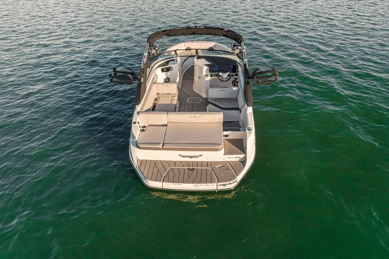 Slide: The Image of Sea Ray SDX 230 Surf 2026 on calm water from above. - 25