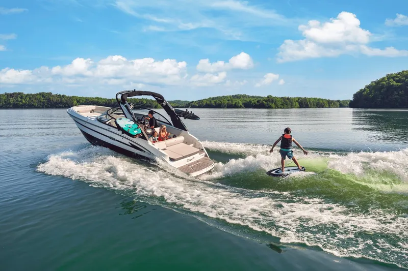 Slide: The Image of 2026 Sea Ray SDX 230 Surf on a tranquil lake. - 33