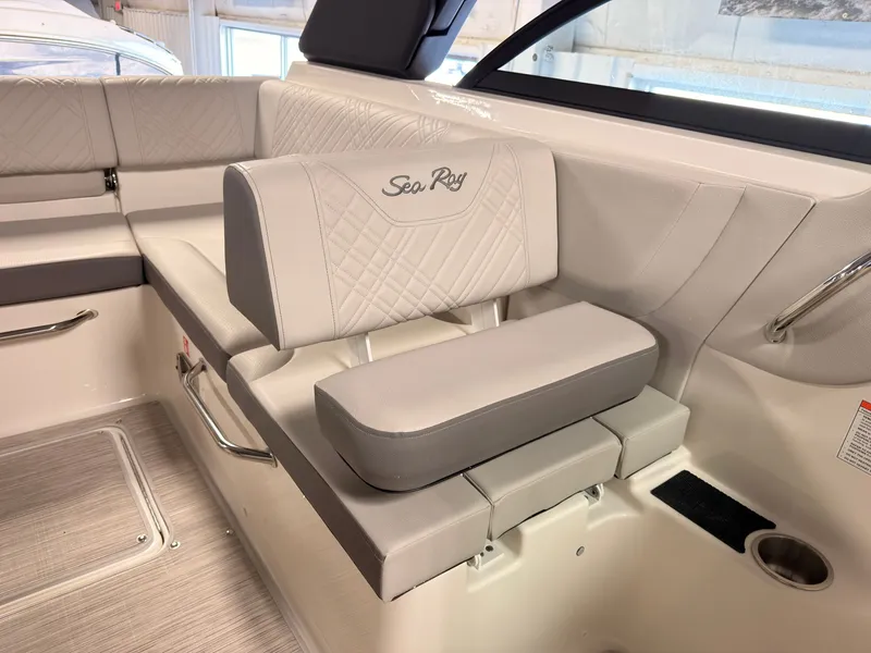Slide: The Image of Interior of a Sea Ray SDX 230 Surf with sleek, upholstered seating and modern design. - 20