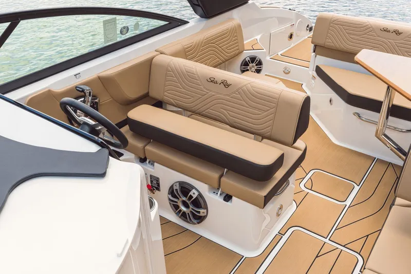 Slide: The Image of Interior of 2026 Sea Ray SDX 250 Surf with luxurious seating. - 22