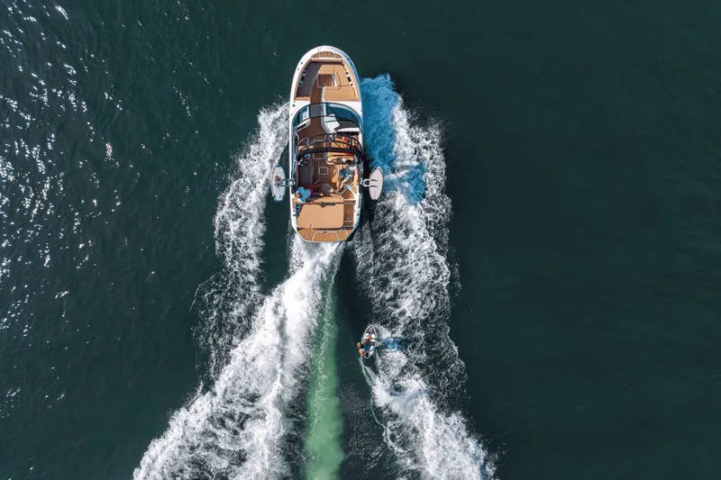 Slide: The Image of Aerial view of Sea Ray SDX 250 Surf boat on water. - 8