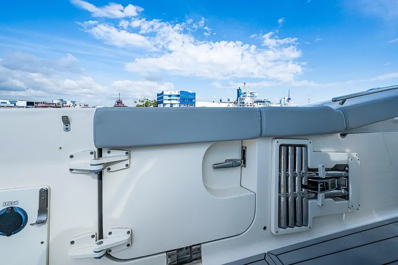 Slide: The Image of 2021 Scout 330 LXF boat interior with sleek seating and modern fittings. - 34