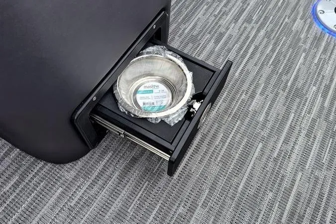 Slide: The Image of Pull-out drawer with pet bowl on Viaggio x22u, 2026 model, on textured flooring. - 12