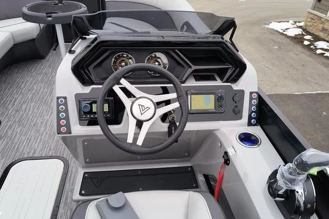 Slide: The Image of Steering console of 2026 Viaggio x22u boat with modern controls and dashboard. - 7