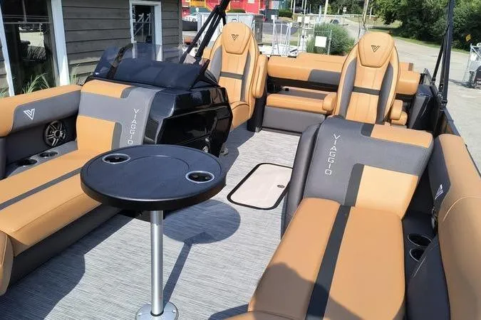 Slide: The Image of Luxurious Viaggio X22S pontoon boat 2026 with stylish seating and table. - 17