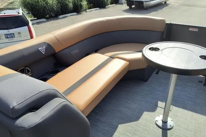 Slide: The Image of Interior of 2026 Viaggio X22S with beige and gray seating. - 18