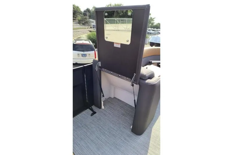 Slide: The Image of Viaggio X22S 2026 boat with folded seat and window. - 23