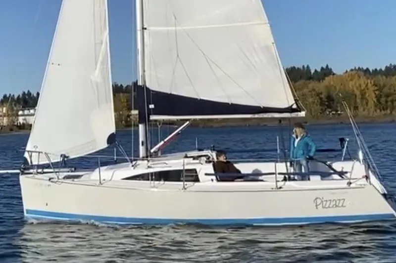Slide: The Image of 2016 Catalina 275 Sport sailboat on calm waters. - 16