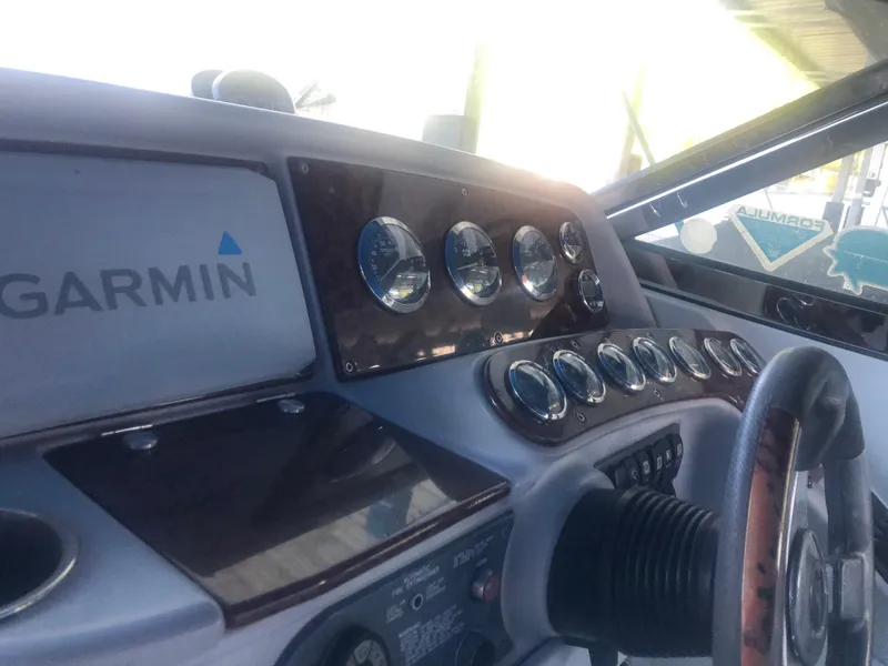 Slide: The Image of Dashboard of 2004 Formula 330 Sun Sport boat with Garmin navigation system. - 28