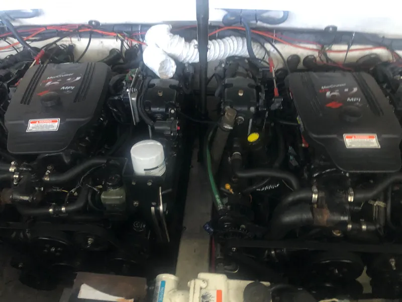 Slide: The Image of Twin MerCruiser engines in a 2004 Formula 330 Sun Sport boat. - 40