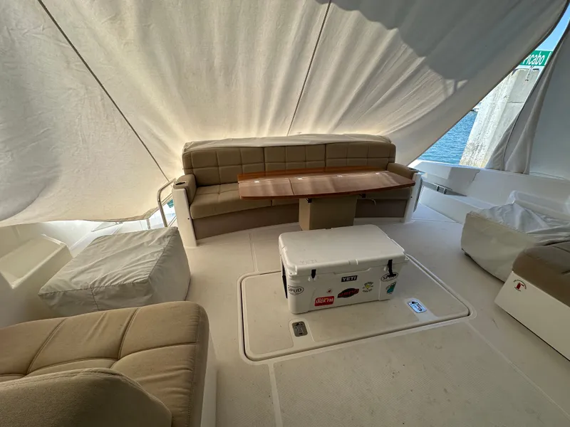 Slide: The Image of Interior of 2015 Tiara Yachts 50 Sports Coupe with seating area. - 16