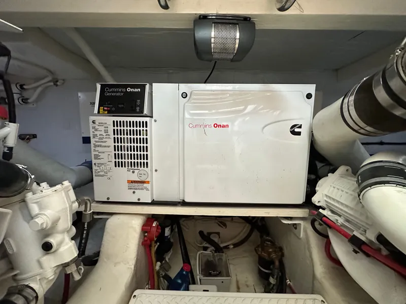 Slide: The Image of Cummins Onan generator in 2015 Tiara Yachts 50 Sports Coupe. - 19