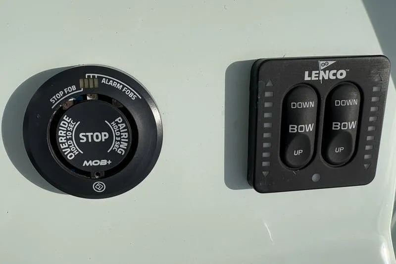 Slide: The Image of Stuart 27 2024 boat controls with Lenco trim tabs. - 14