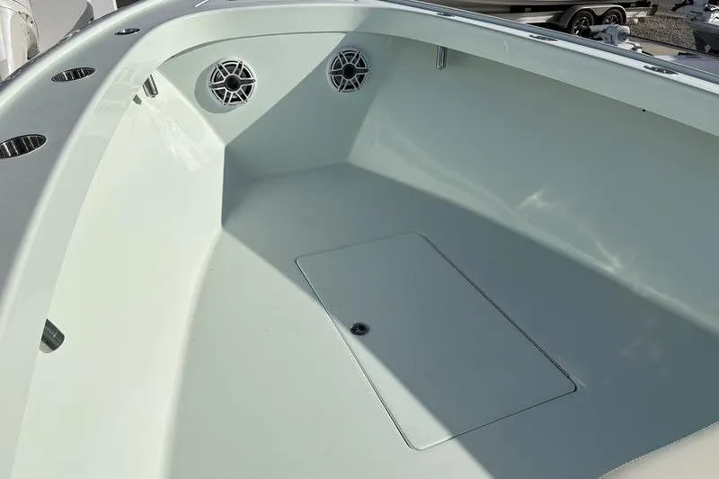 Slide: The Image of Interior of a 2024 Stuart 27 boat with speakers. - 4