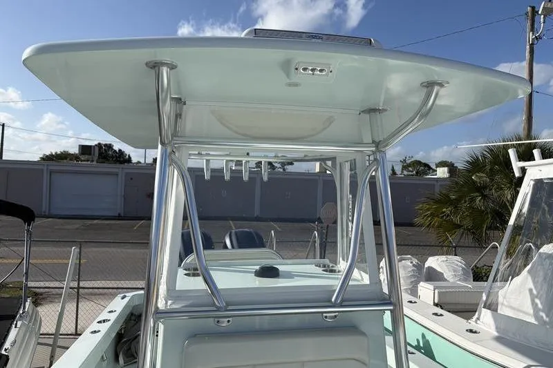 Slide: The Image of 2024 Stuart 27 boat with T-top and stainless steel frame. - 7
