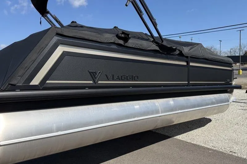 Slide: The Image of Viaggio x22u 2026 pontoon boat with black cover, side view. - 2