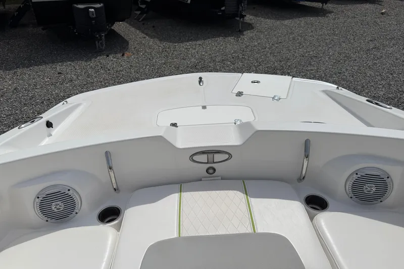 Slide: The Image of 2022 Tahoe 2150 boat interior with speakers and seating, showcasing modern design. - 20