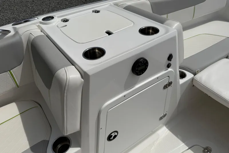 Slide: The Image of Interior of 2022 Tahoe 2150 boat featuring seating and storage compartments. - 31