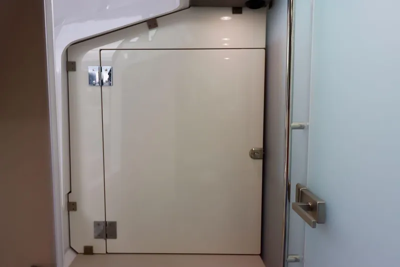 Slide: The Image of Interior cabin door of 2022 Axopar 37 XC Cross Cabin boat. - 28